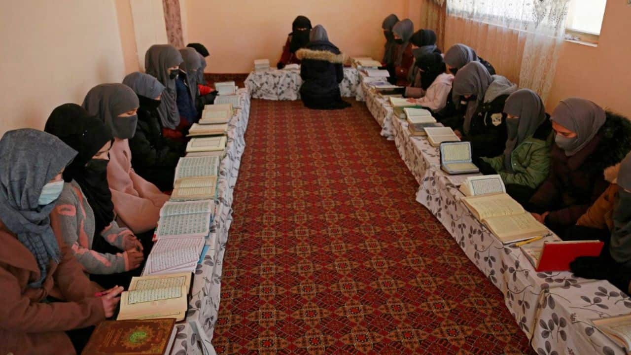 In a madrassa in the Afghan capital, rows of teenage girls rock back and forth reciting verses of the Koran under the watchful eye of a religious scholar. The number of Islamic schools has grown across Afghanistan since the Taliban returned to power in August 2021, with teenage girls increasingly attending classes after they were banned from secondary schools. (Source: AFP)