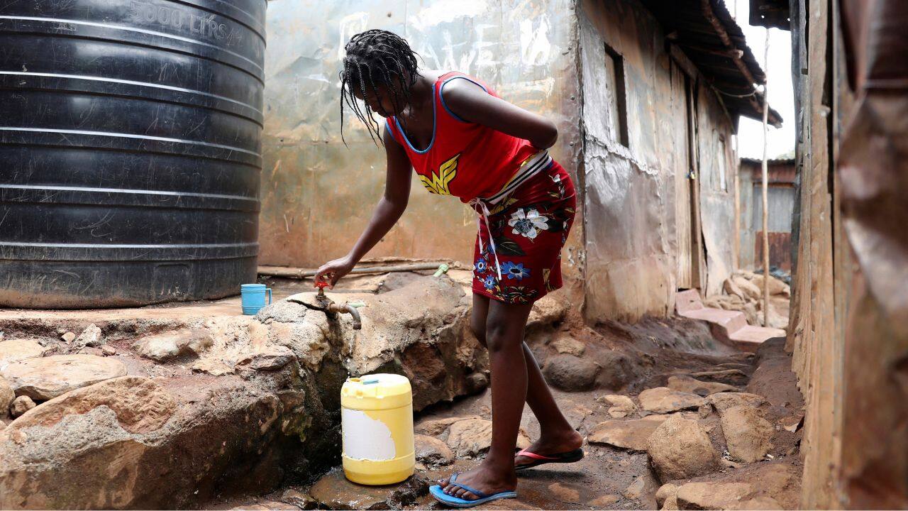 Kenya's dry weather and a lack of infrastructure means many people gather water at local hubs to collect enough. (Source: AP)
