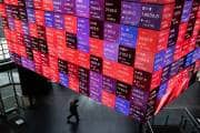 Asian stocks edge up after record on Wall Street