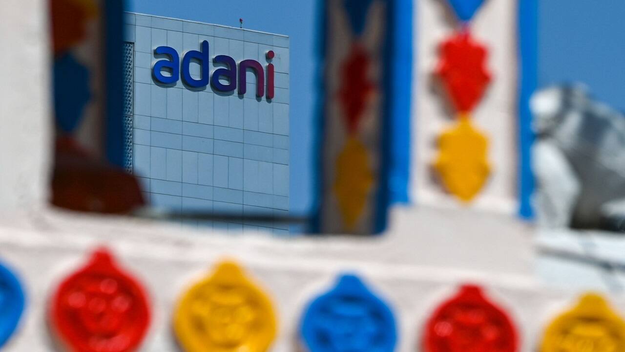 Shares of Adani Enterprises Ltd gained 4 percent. According to a Bloomberg report, Adani Cement Industries has pre-paid $200 million in the past week helping pare a $1 billion mezzanine loan taken from global banks to fund the purchase of the Indian units of Holcim Ltd. The prepayment will help the billionaire Gautam Adani's firm seek an extension of the debt taken to fund the acquisition by three years, the Bloomberg report said. Global Banks had lent Adani $4.5 billion to finance the acquisition of Holcim Ltd cement assets with mezzanine loans due for maturity in September 2024. Shares of Adani Enterprises Ltd gained 4 percent. According to a Bloomberg report, Adani Cement Industries has pre-paid $200 million in the past week helping pare a $1 billion mezzanine loan taken from global banks to fund the purchase of the Indian units of Holcim Ltd. The prepayment will help the billionaire Gautam Adani's firm seek an extension of the debt taken to fund the acquisition by three years, the Bloomberg report said. Global Banks had lent Adani $4.5 billion to finance the acquisition of Holcim Ltd cement assets with mezzanine loans due for maturity in September 2024.
