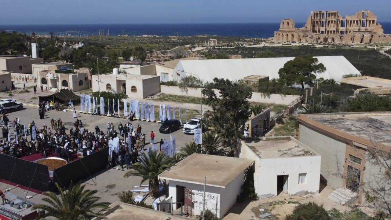 Families gathered happily for the event, which was guarded by police, while young people filmed the scene with their phones. In hefty stainless steel pots, the cooks stirred the semolina, reddened by tomato juice, and heaped cooked ingredients onto platters. "I haven't slept all night," said one of kitchen assistant, taking a short break on a garden chair with a tired smile on his face. (Source: AFP) Families gathered happily for the event, which was guarded by police, while young people filmed the scene with their phones. In hefty stainless steel pots, the cooks stirred the semolina, reddened by tomato juice, and heaped cooked ingredients onto platters. "I haven't slept all night," said one of kitchen assistant, taking a short break on a garden chair with a tired smile on his face. (Source: AFP)