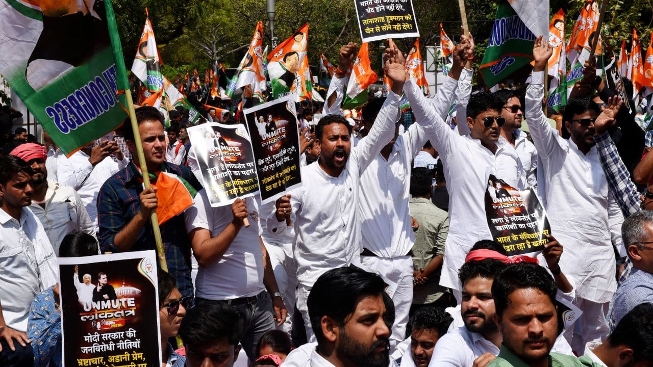 In Pics: Opposition wears black to protest against Rahul Gandhi's ...