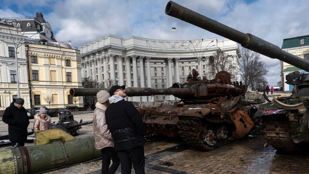 It’s a strange type of new normality, where the harsh objects of a brutal war have been incorporated into the scenery of regular city life. (Source: AP) It’s a strange type of new normality, where the harsh objects of a brutal war have been incorporated into the scenery of regular city life. (Source: AP)