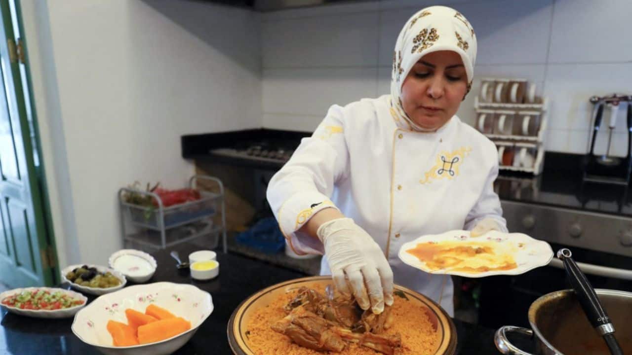 The 43-year-old runs a restaurant and prides herself for pastry creations inspired by current trends on social media. But she said cooking couscous is a tradition that requires strict adherence to age-old recipes, which she called a "red line". (Source: AFP) The 43-year-old runs a restaurant and prides herself for pastry creations inspired by current trends on social media. But she said cooking couscous is a tradition that requires strict adherence to age-old recipes, which she called a "red line". (Source: AFP)