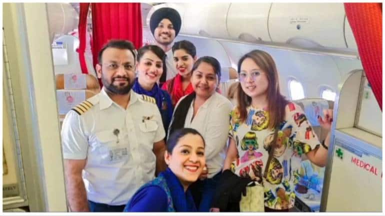 Woman gets anxiety attack on Air India flight, says 'angels' helped her - Vimarsana News