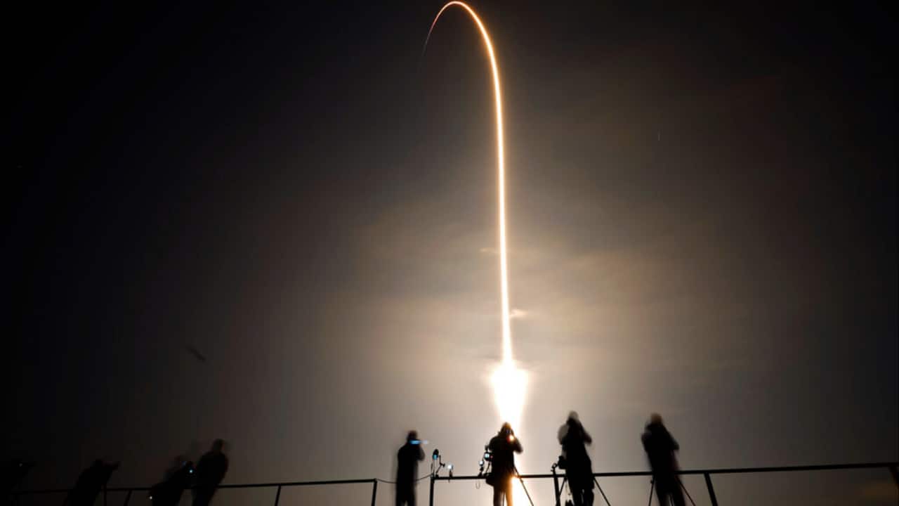 A SpaceX Falcon 9 rocket lifts off in this time exposure photograph from Launch Pad 39-A, March 2 at the Kennedy Space Center in Cape Canaveral, Fla. Four astronauts are beginning a mission to the International Space Station.