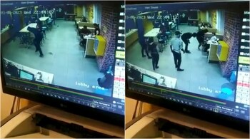 CCTV footage shows a rat scurrying through a McDonald's outlet (Image: @SHenrixs/Twitter)