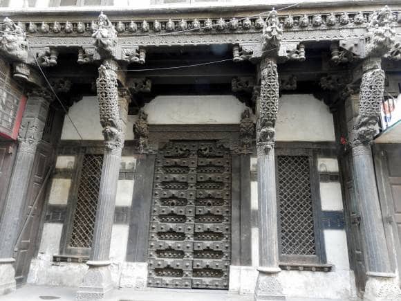 Said to be one the most ornate and grand havelis in Ahmedabad, Harkunvar Shethani ni Haveli is a stunning example of how a wood facade can be an integral architectural feature in a home. (Photo by Bindu Gopal Rao)