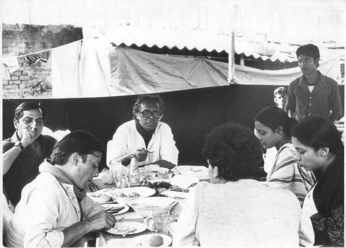 On location for the shoot of 'Khandahar' (1983). Those visible are Sen (centre), cinematographer KK Mahajan to Sen’s left, Pankaj Kapur (front left), Shabana Azmi (front right) and Sreela Majumdar to the right of Sen. (Photo courtesy the Sen family collection)