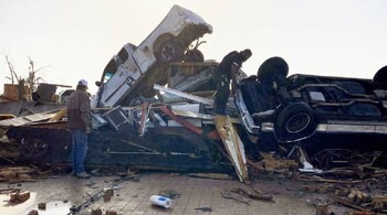 Search and rescue teams were also out in Rolling Fork, a town of 1,700 people that saw the brunt of the tornado (Image: AP)