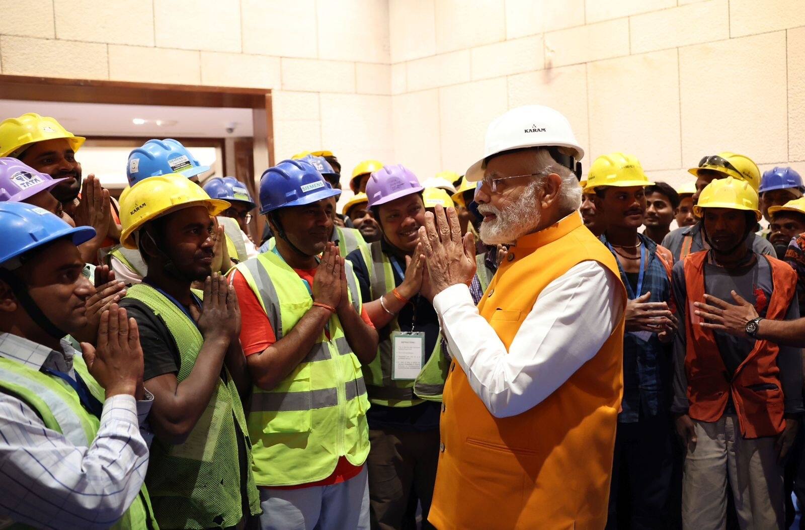 Prime Minister Modi also interacted with the construction workers. (Image: Twitter/ MyGovIndia) Prime Minister Modi also interacted with the construction workers. (Image: Twitter/ MyGovIndia)