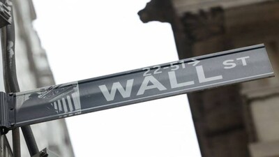 Tesla, Netflix pull Nasdaq and S&P lower, Dow ends higher