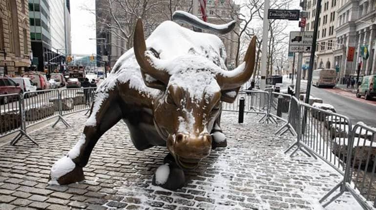 The Charging Bull statue near the New York Stock Exchange (NYSE) in New York, US. (Source: Bloomberg) The Charging Bull statue near the New York Stock Exchange (NYSE) in New York, US. (Source: Bloomberg)