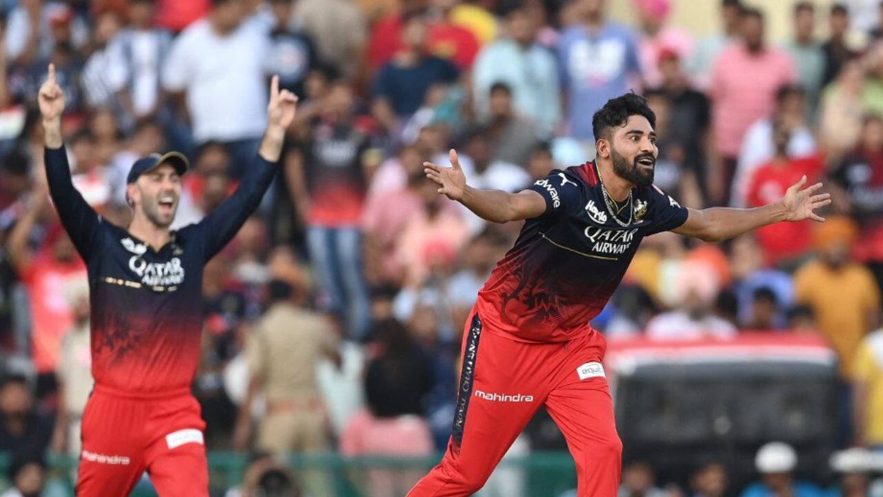 Siraj got two breakthroughs at the start, including the dangerous England import Liam Livingstone for two, and leg-spinner Wanindu Hasaranga bowled Australia's Matthew Short for eight. (Image: AFP)