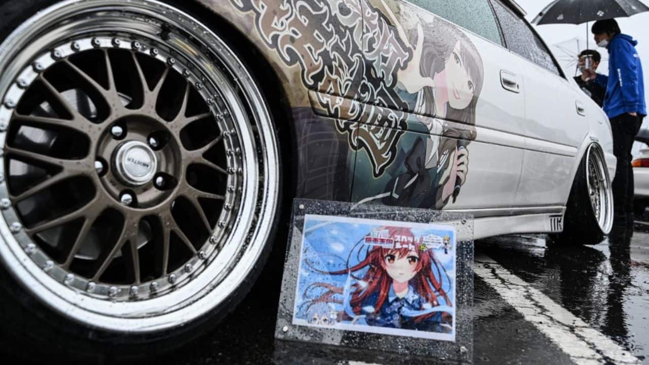 Seeing the finished product can be an emotional moment for owners such as Ryosuke Nakano, who took his customised Nissan Skyline to Imai's shop for a full body wrap. Nakano had dabbled in small window stickers before, but nothing approaching the scale of Imai's design, which splashes massive gun-toting &quot;Lycoris Recoil&quot; characters on the front and sides of the car. &quot;When I had window stickers, it would only be the people behind me who could see it, so I'm a bit scared of how people will react when they see this from the front,&quot; said the 29-year-old. &quot;But I don't care. This is what I like.&quot; (Source: AP)