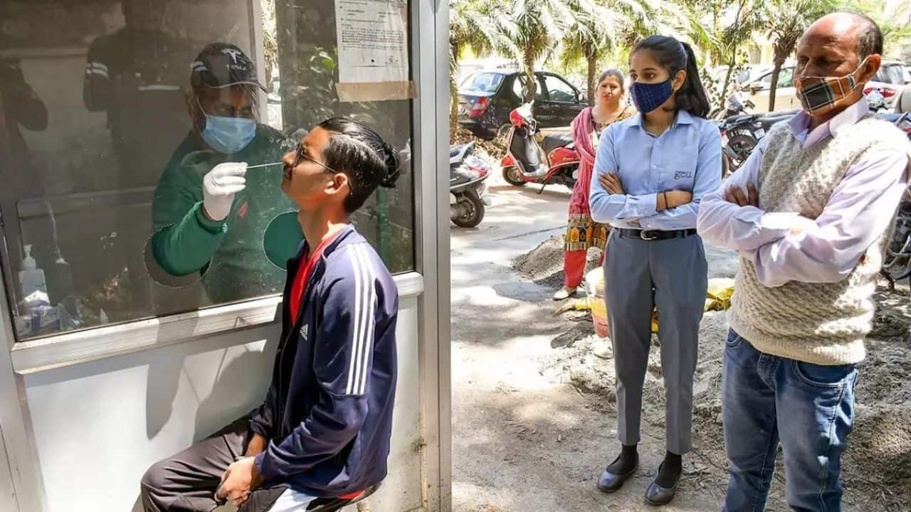 A healthcare worker collects a swab sample of a man for Covid-19 test, amid a sudden spurt in Covid cases in the country, in Dehradun. (Image: PTI)