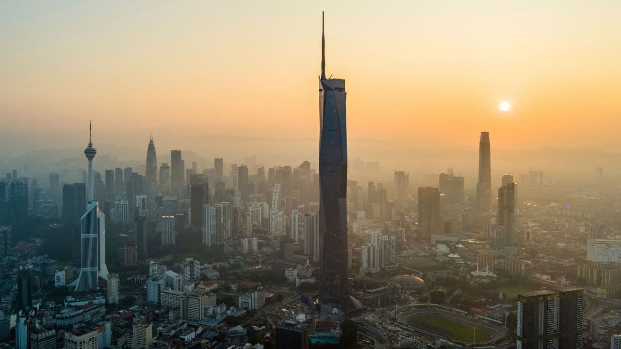 In megacities, like the rapidly growing Kuala Lumpur in Malaysia, skyscrapers shoot upwards while in Guyana excavators dig deep into the earth for deposits of gold. (Image: AP)