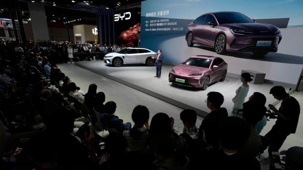 Chinese automaker BYD presents its latest cars during the Auto Shanghai 2023 show in Shanghai. (Image: AP)
