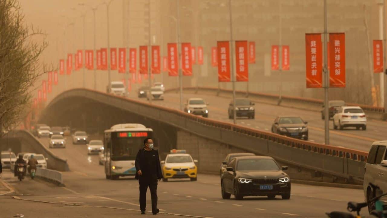 It renewed a blue alert for sandstorms — the least severe warning in the country’s four-tier weather warning system — and forecast that more than a dozen regions, including major cities like Beijing and Shanghai, would see some areas affected by floating sand and dust on April 13. (Image: AFP)
