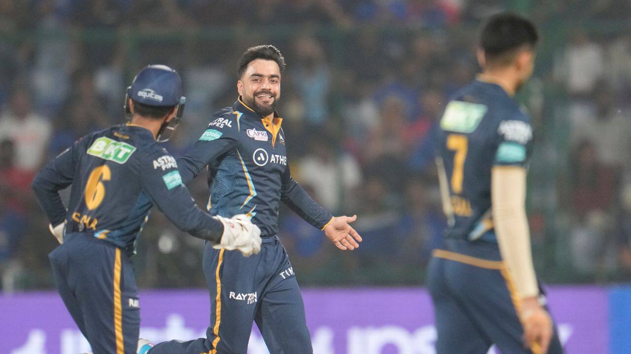 Rashid squeezed the runs in the middle overs with his sharp leg breaks and googlies as Safaraz Khan labored for 34 deliveries in making 30 before top-edging a sweep against the leg-spinner in the 17th over. (Source: AP) Rashid squeezed the runs in the middle overs with his sharp leg breaks and googlies as Safaraz Khan labored for 34 deliveries in making 30 before top-edging a sweep against the leg-spinner in the 17th over. (Source: AP)