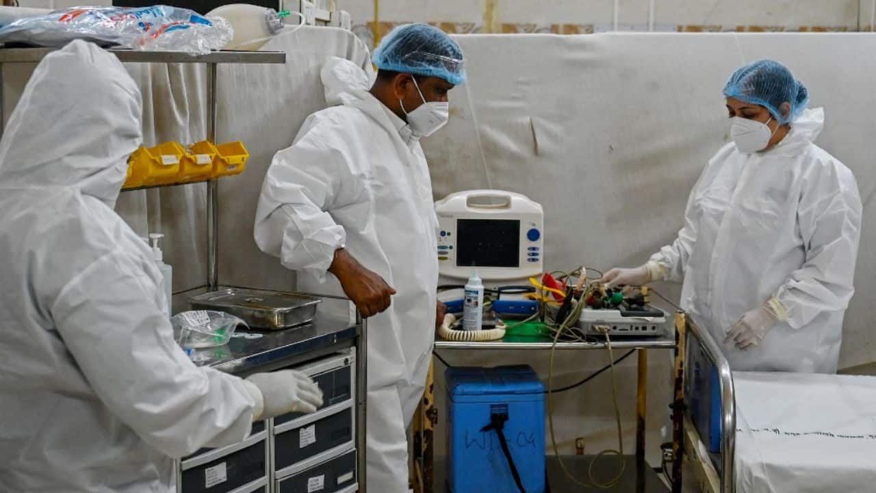 Amid a spike in COVID-19 cases, mock drills to take stock of hospital preparedness are being held in several public and private facilities across the country on April 10. Union Health Minister Mansukh Mandaviya visited the Ram Manohar Lohia Hospital in the city to review the mock drill there. (Image: AFP)