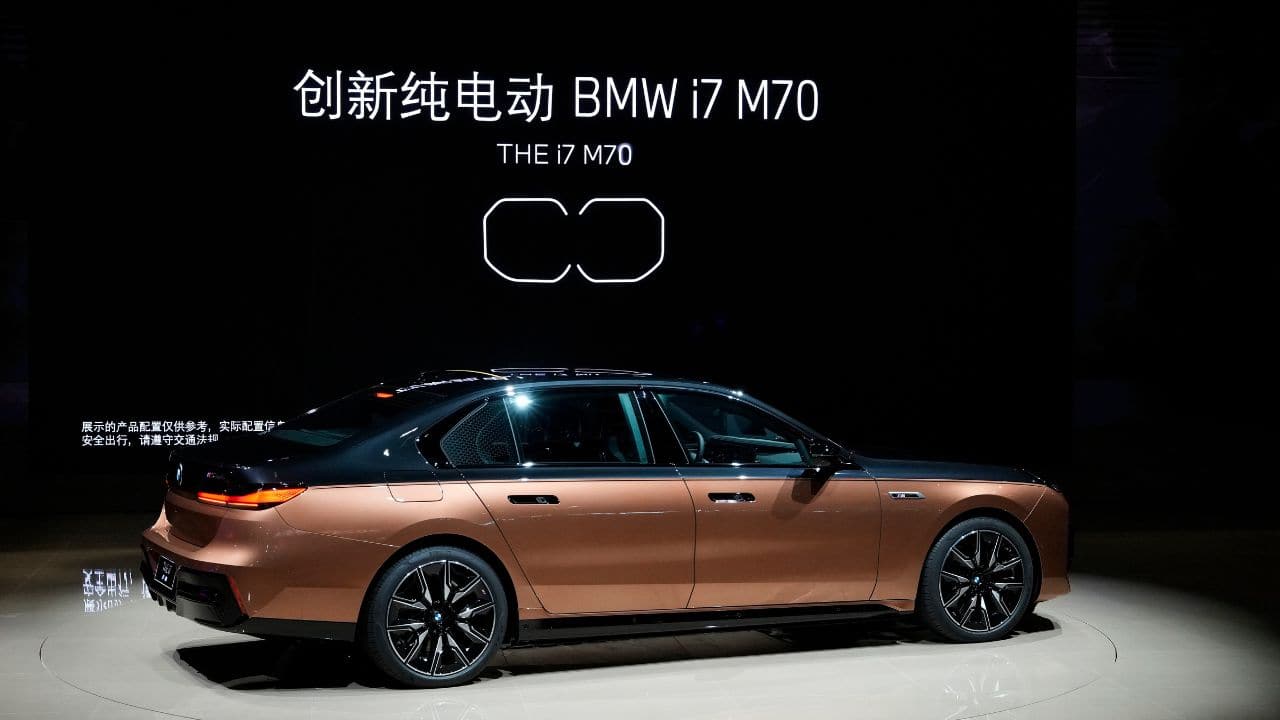BMW's i7 M70, its new electric flagship sedan is unveiled in the press day of the Auto Shanghai 2023 at the National Exhibition and Convention Center in Shanghai, China. (Image: AP)