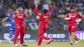 Punjab Kings' Arshdeep Singh with teamates celebrates the wicket of Mumbai Indians batter Ishan Kishan during the IPL 2023 cricket match against Mumbai Indians, at Wankhede Stadium in Mumbai, on April 22, 2023. (PTI Photo)