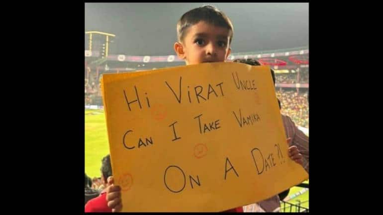 'Can I take Vamika on a date?': Little boy's placard for Virat Kohli sparks Twitter outrage - Vimarsana News