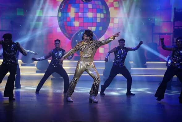 Arjun Talwar as Jimmy in 'Disco Dancer' stage musical in London.