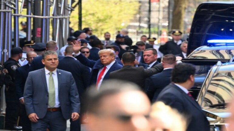 Former US president Donald Trump arrives ahead of his arraignment at the Manhattan Criminal Court in New York on April 4, 2023. (AFP)