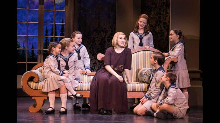 Jill-Christine Wiley with the children in the play 'The Sound of Music', which is travelling to NMACC, Mumbai.