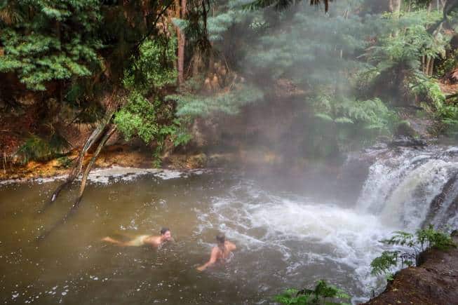 Occasionally geysers erupt in people’s backyards, pavements and in public parks, but head to the verdant Kerosene Creek in Rotorua, New Zealand, for a free dip.