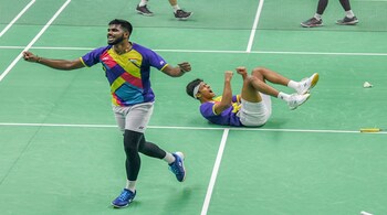 Badminton players Chirag Shetty and Satwiksairaj Rankireddy celebrate after winning the gold medal in men's doubles at Badminton Asia Championships 2023, in Dubai, on April 30, 2023. (PTI Photo)