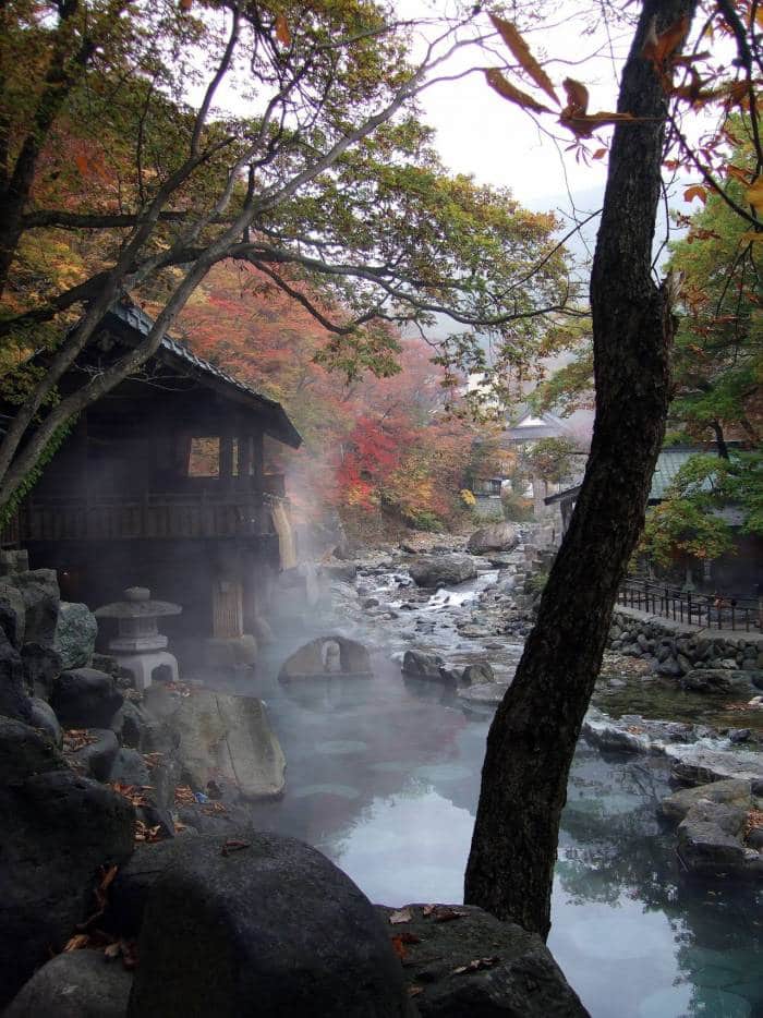 Tucked in a forest, the Takaragawa Onsen’s hot springs give stunning views of snow-capped mountains around.
