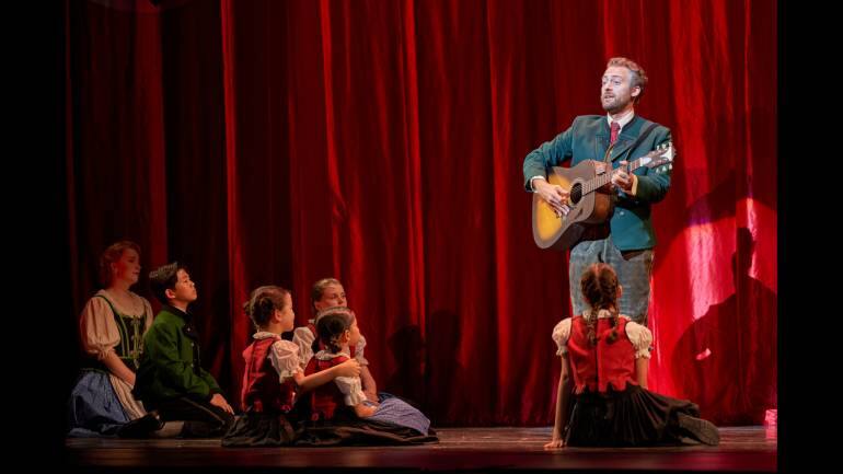 Trevor Martin with the children in the play The Sound of Music