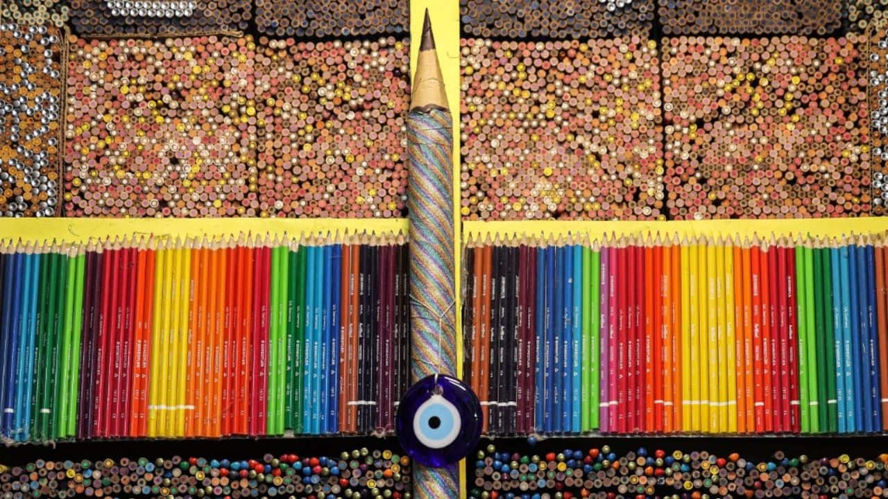 With the pencils stacked from floor to ceiling, his tiny cubicle has become a photogenic splash of colour, hidden deep in the market known as a &quot;city within a city&quot;. &quot;I don't know how many pencils there are but I have about 200 colours available,&quot; said the proud 50-year-old owner of the Medad Rafi (Rafi's pencils) shop. (Source: AFP)