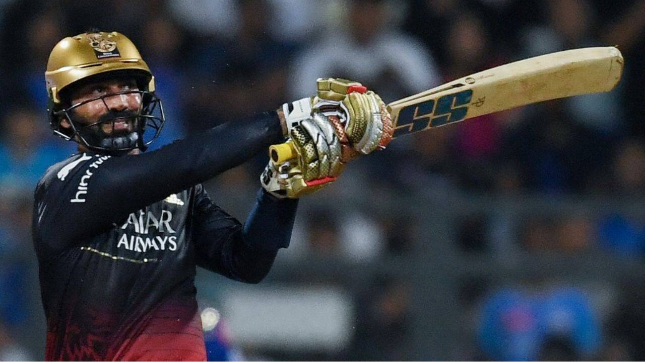 Dinesh Karthik scored 30 off 18 balls, while Kedar Jadhav and Wanindu Hasranga contributed 12 runs each, but Bangalore only managed a sub-par score on a batting beauty at the Wankhede. (Image: AFP)