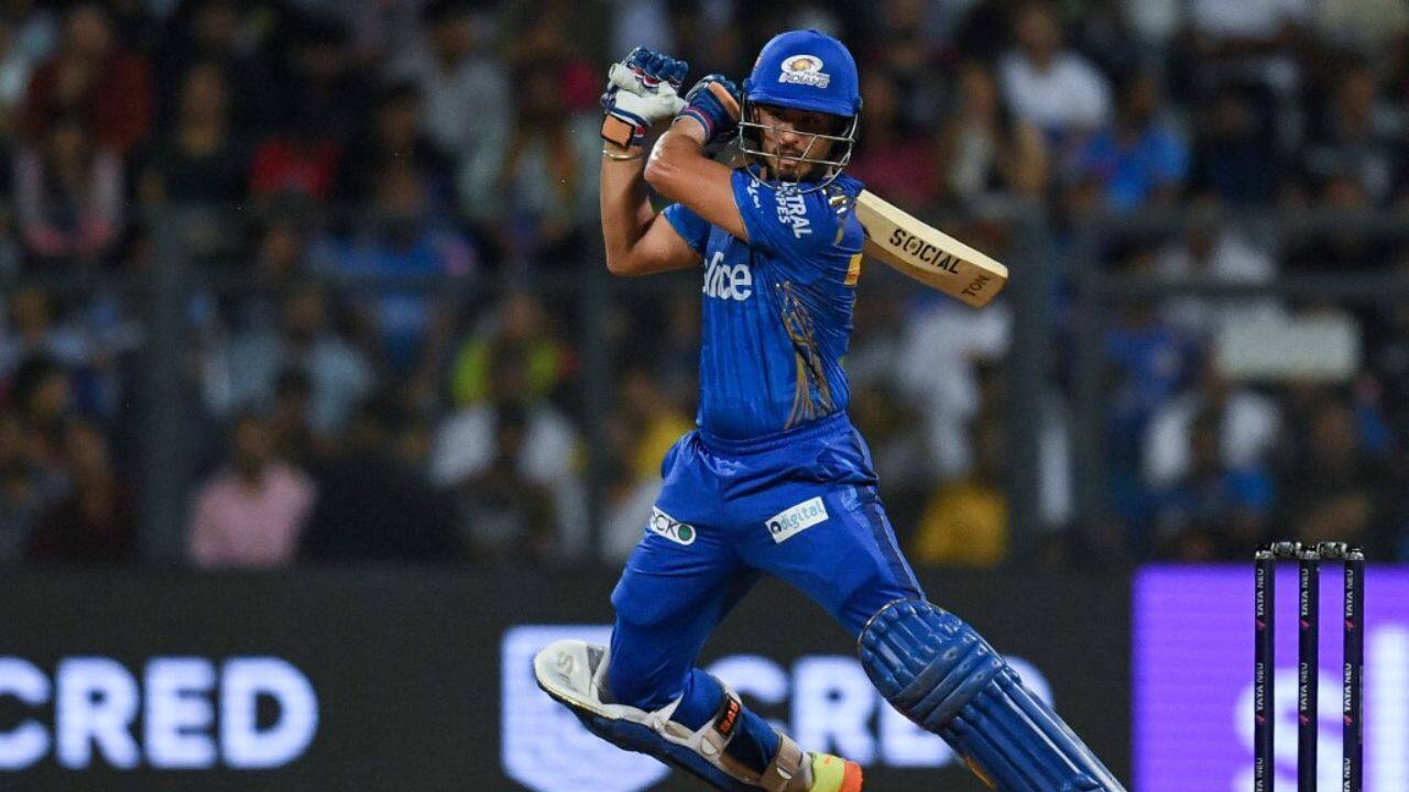 Tim David fell for a first ball duck thereafter, but Wadhera made sure Mumbai crossed the finish line with 21 balls to spare, the highest margin in a 200-plus run-chase in IPL history. Bangalore slipped to seventh in the table, on 10 points but behind Rajasthan Royals and Kolkata Knight Riders on net run-rate. (Image: AFP)