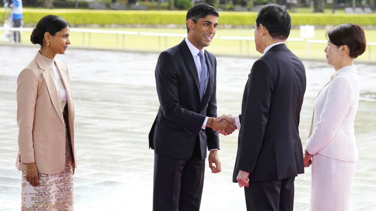 The Japanese leader -- whose wife wore a gold pin shaped like an origami crane, an unofficial symbol of the city's nuclear legacy -- wants to put disarmament on the agenda as the bloc holds three days of talks. (Image: AP)