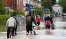 In Pics: Rescue workers reach Italian towns isolated by floods as death toll rises to 13
