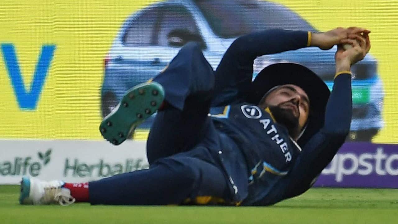 Rashid Khan of defending champion Gujarat Titans was awarded with the ‘Catch of the Tournament’ award for his exceptional catch of Kyle Mayers during the match against Lucknow Super Giants. (Image: AFP)