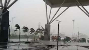 Metal beams from the roof lay on the road in front of Sir M Visvesvaraya Terminal in Bengaluru. (Screengrab from video shared by @Lolita_TNIE on Twitter)