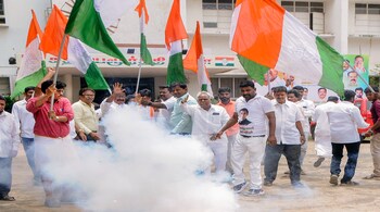 Congress leaders and supporters celebrate the party's decisive lead in the Karnataka Assembly polls, at the party office, in Chennai (PTI Photo)