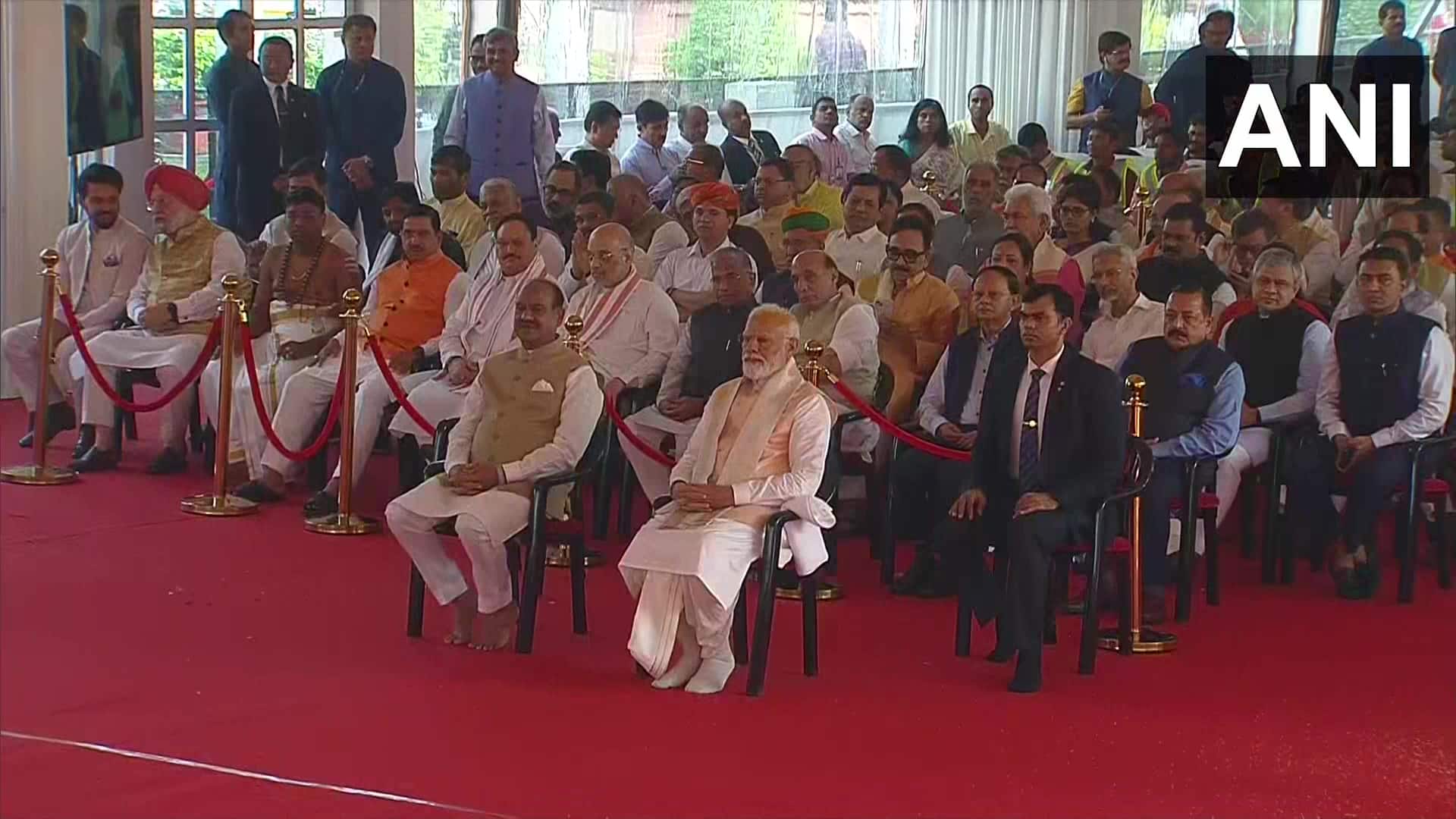 PM Modi along with Lok Sabha Speaker Om Birla and Cabinet ministers attends a 'Sarv-dharma' prayer ceremony being held at the new Parliament building (Image credit: ANI)