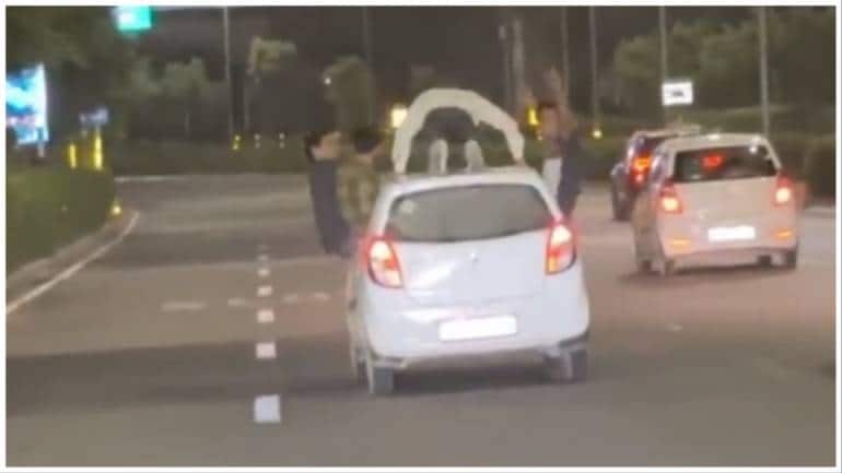 Gurgaon man does push-ups on top of moving car in viral video
