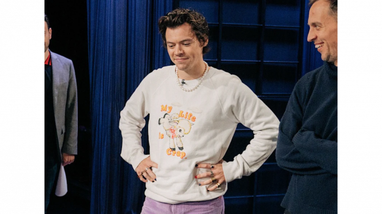 Whether he’s in a tailored suit or a Vans sweatshirt, Styles has much love for pearls