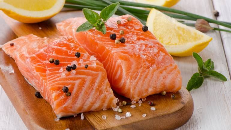 Salmon: Not only is salmon rich in heart-healthy omega-3 fatty acids, but it also provides a good dose of protein, with around 22 grams per 3-ounce serving. Incorporating salmon into your diet can support muscle repair and promote cardiovascular health (Image: Canva)