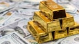 Gold hits 1-week low as dollar strengthens after weak China data