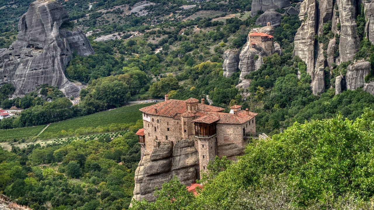The cliff-top monasteries of Meteora in central Greece were built between the 14th and 17th centuries, by monks seeking solitude and later, refuge from the Ottoman conquest of the territory in the mid 15th century. (Photo by Ron Rov via Pexels)