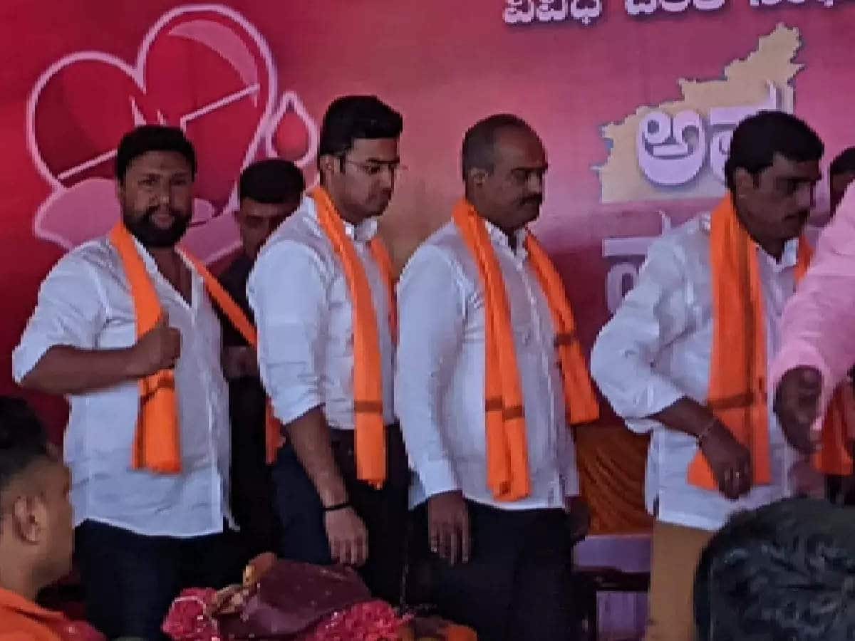 'Silent' Sunil (L) and Karnataka BJP MP Tejasvi Surya.
